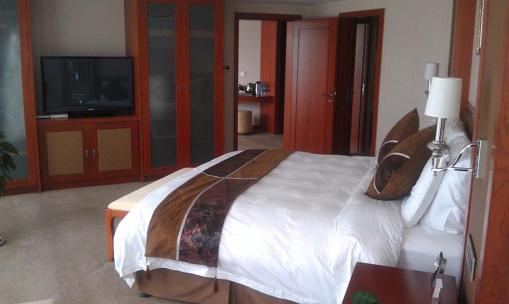 Xi'An Qu Jiang Yin Zuo Hotel Exteriör bild