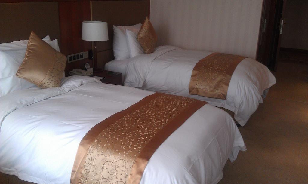 Xi'An Qu Jiang Yin Zuo Hotel Exteriör bild