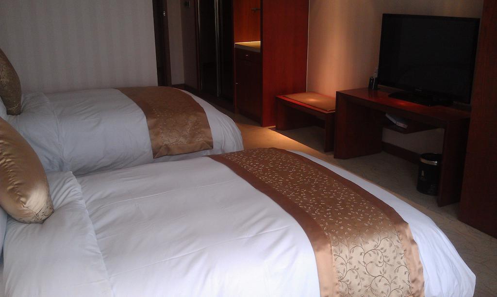 Xi'An Qu Jiang Yin Zuo Hotel Exteriör bild